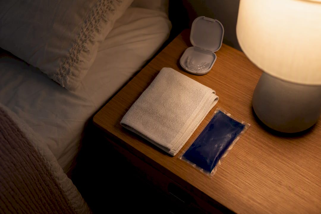 Child bedside table with night guard and warm compress
